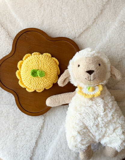 Handmade crochet lemon hat and bib outfit for Jellycat plush – outfit displayed next to Lollie Lamb